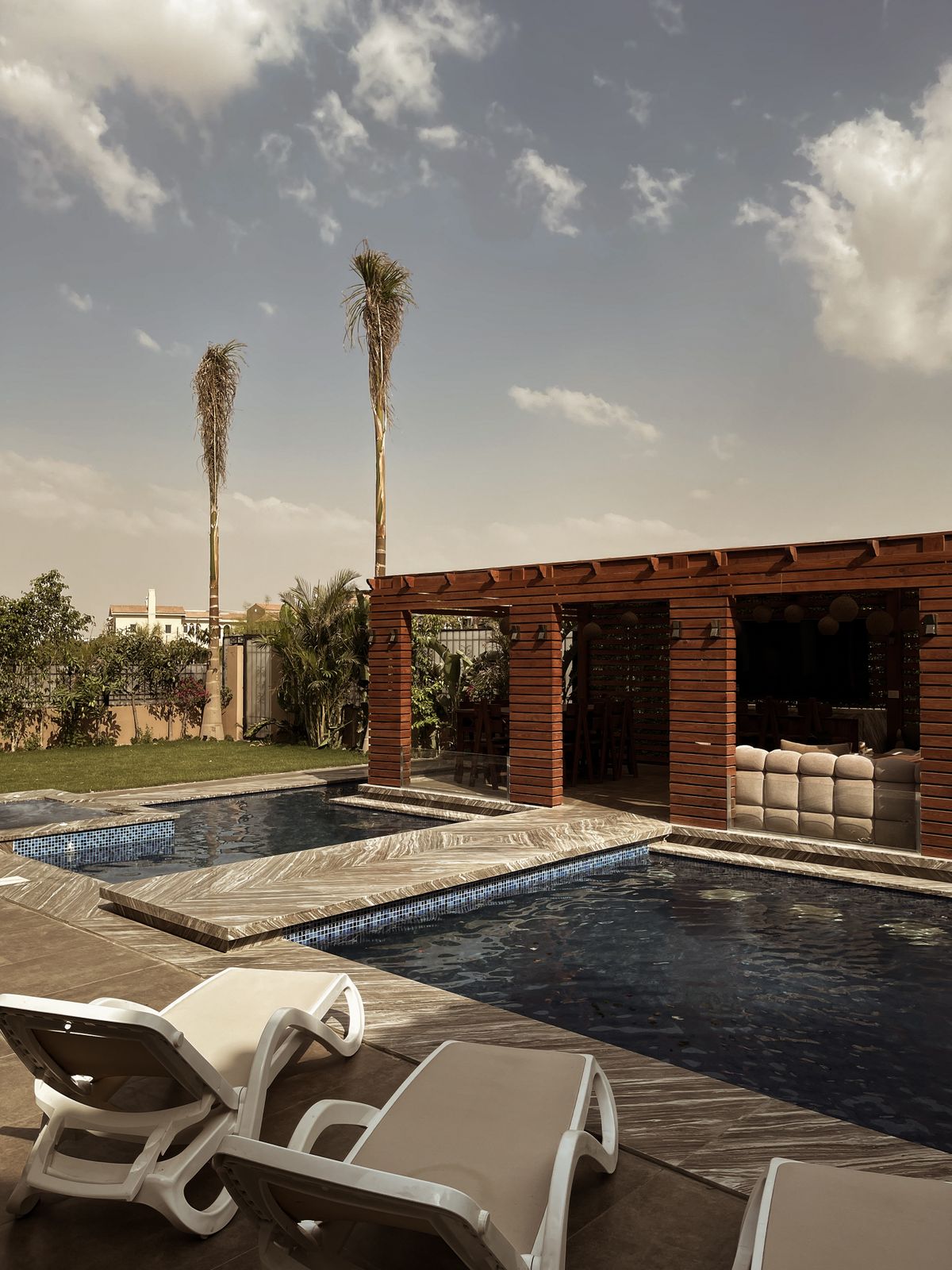 Poolside pergola lounge